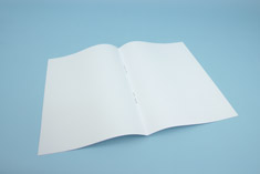 Brochure with loop stitching - open